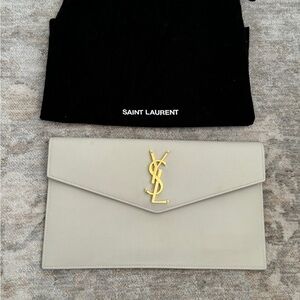 YSL UPTOWN POUCH IN GRAIN DE POUDRE LEATHER